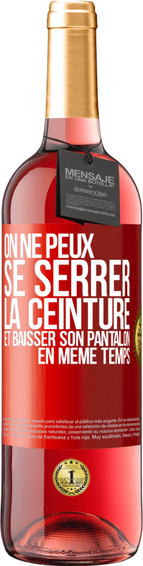 29,95 € | Vin rosé Édition ROSÉ On ne peux se serrer la ceinture et baisser son pantalon en même temps Étiquette Rouge. Étiquette personnalisable Vin jeune Récolte 2025 Tempranillo