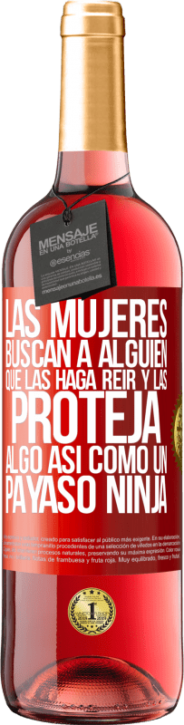 29,95 € Envío gratis | Vino Rosado Edición ROSÉ Las mujeres buscan a alguien que las haga reír y las proteja, algo así como un payaso ninja Etiqueta Roja. Etiqueta personalizable Vino joven Cosecha 2025 Tempranillo