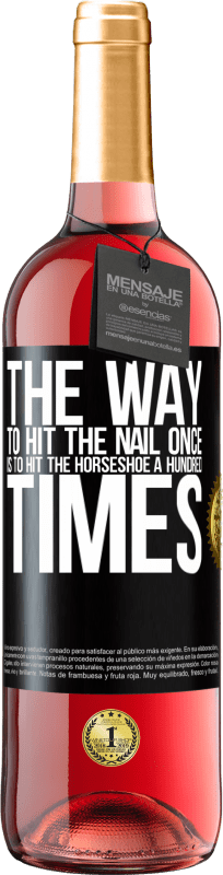 29,95 € Free Shipping | Rosé Wine ROSÉ Edition The way to hit the nail once is to hit the horseshoe a hundred times Black Label. Customizable label Young wine Harvest 2025 Tempranillo
