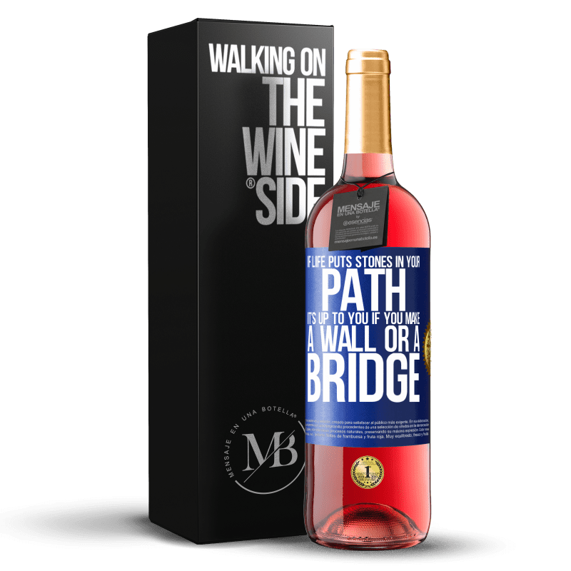 29,95 € Free Shipping | Rosé Wine ROSÉ Edition If life puts stones in your path, it's up to you if you make a wall or a bridge Blue Label. Customizable label Young wine Harvest 2023 Tempranillo