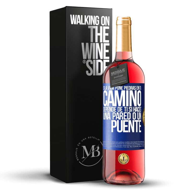 29,95 € Envío gratis | Vino Rosado Edición ROSÉ Si la vida pone piedras en tu camino, depende de ti si haces una pared o un puente Etiqueta Azul. Etiqueta personalizable Vino joven Cosecha 2023 Tempranillo