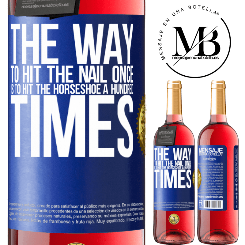 24,95 € Free Shipping | Rosé Wine ROSÉ Edition The way to hit the nail once is to hit the horseshoe a hundred times Blue Label. Customizable label Young wine Harvest 2021 Tempranillo