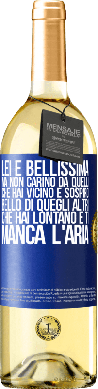 29,95 € | Vino bianco Edizione WHITE Lei è bellissima Ma non carino da quelli che hai vicino e sospiro. Bello di quegli altri, che hai lontano e ti manca l'aria Etichetta Blu. Etichetta personalizzabile Vino giovane Raccogliere 2025 Verdejo