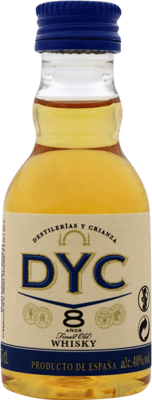 Kostenloser Versand | Blended Whisky DYC Spanien 8 Jahre Miniaturflasche 5 cl