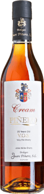 Envío gratis | Crema de Licor Juan Piñero Cream VOS D.O. Jerez-Xérès-Sherry Andalucía España Palomino Fino, Pedro Ximénez Botella Medium 50 cl