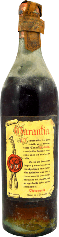 302,95 € | Brandy Conhaque Destilería Berenguer Coñac Doblón solo Contraetiqueta 1940's Espanha 75 cl Exemplar de colecionador Não Próprio para Consumo