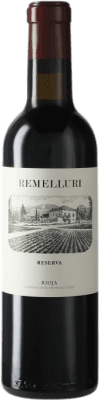 Бесплатная доставка | Красное вино Ntra. Sra. de Remelluri Резерв D.O.Ca. Rioja Ла-Риоха Испания Tempranillo, Grenache, Graciano Половина бутылки 37 cl