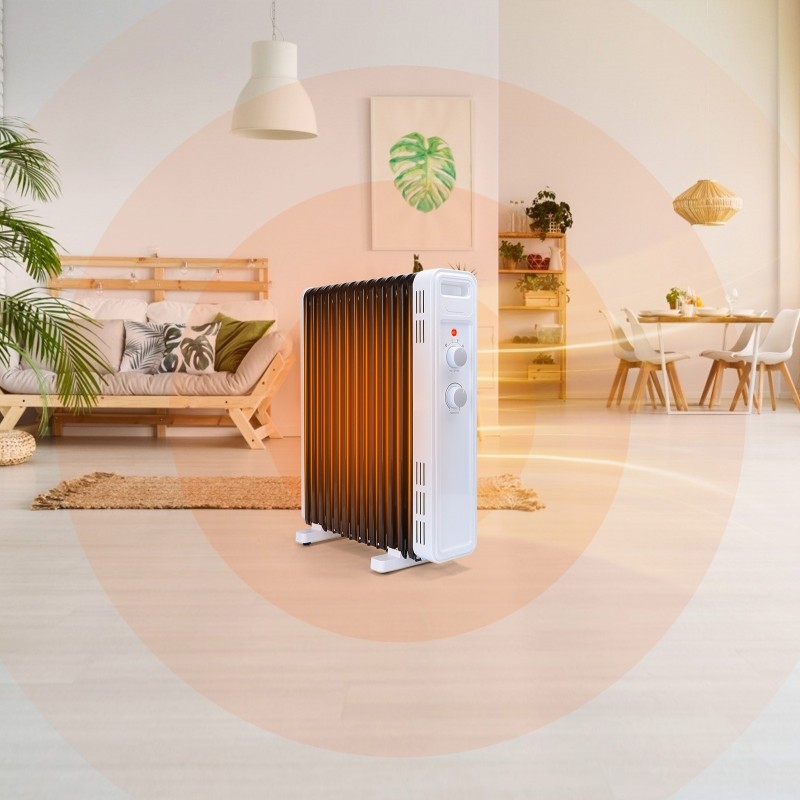 79,95 € Free Shipping | Heater 2300W 57×39 cm. Portable oil radiator. 11 elements. 3 power levels. Adjustable thermostat. rollover protection Steel. White and black Color
